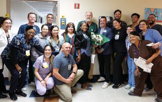 Group celebrating daisy winner