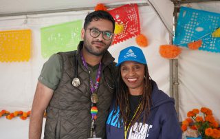 AHS staff tabling Dia De Los Muertos event 2024