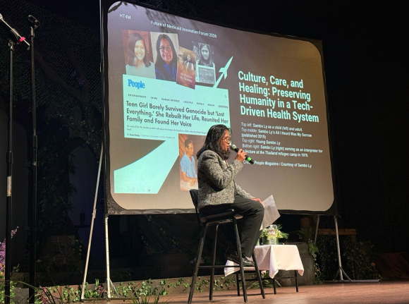 Sambo Ly talking at conference